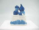 Blue & White Figurine: Dutch Couple Sitting on Bench - ScandinavianGiftOutlet