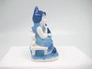 Blue & White Figurine: Dutch Couple Sitting on Bench - ScandinavianGiftOutlet
